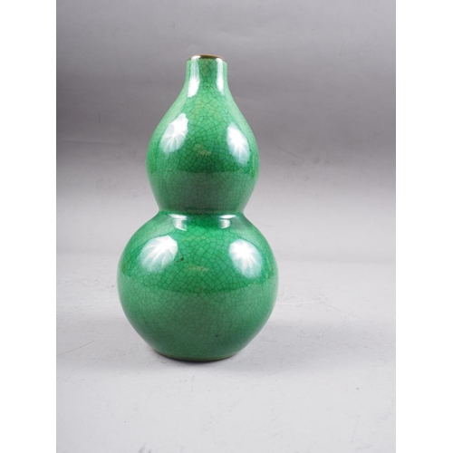 85 - A Chinese porcelain green crackle glazed double gourd vase, 6