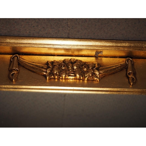 493 - A gilt framed overmantel mirror with swag decoration, plate 21