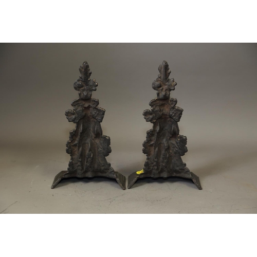 136 - A pair of 19th century cast iron burnished door stops, formed as 19th century gentlemen, on stepped ... 