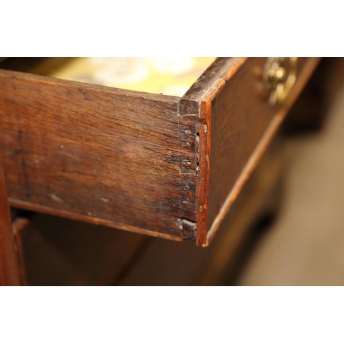 476 - A late 18th century oak bureau with fitted interior, over one long drawer, two short drawers and two... 