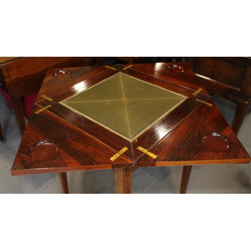 498 - An Edwardian rosewood, line inlaid and marquetry envelope card table, inset single drawer, on square... 