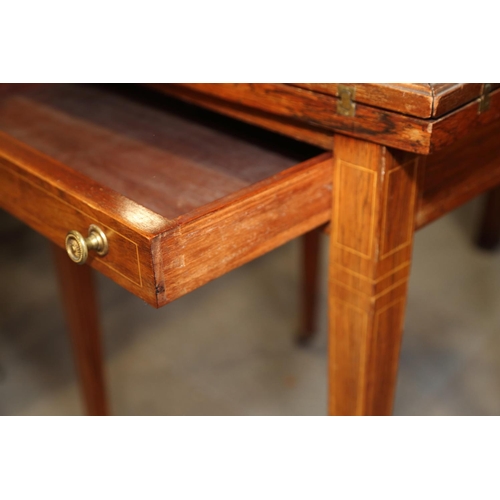 498 - An Edwardian rosewood, line inlaid and marquetry envelope card table, inset single drawer, on square... 