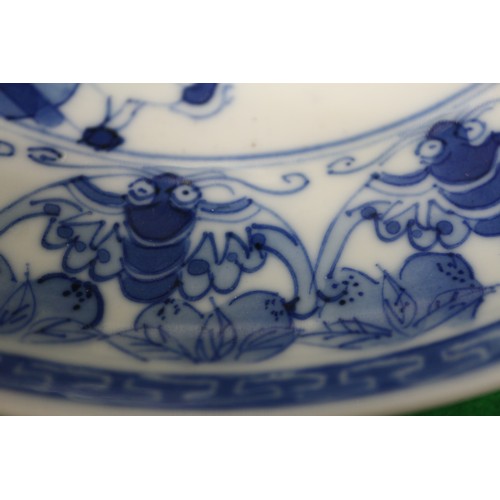 90 - A Chinese blue and white plate with centre decorated immortals and border decorated bats, 8