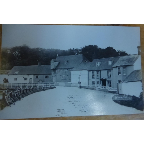 32 - Domestic and Street Scene Postcards. A large box with both early monochrome scenes and later colour ... 