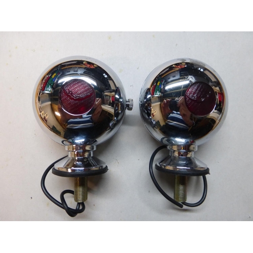 167 - A Pair of Indicator Lamps in the style of Stephen Grebel, chromium-plated with orange front glasses ... 