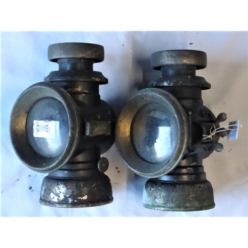 177 - A Pair of Lucas F141 Oil Lamps. In sound condition with component parts insitu, brass bodies with bl... 