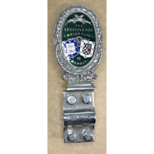 180 - The Brighton & Hove Motor Club. A rare oval designed members badge with the town badges in multi... 