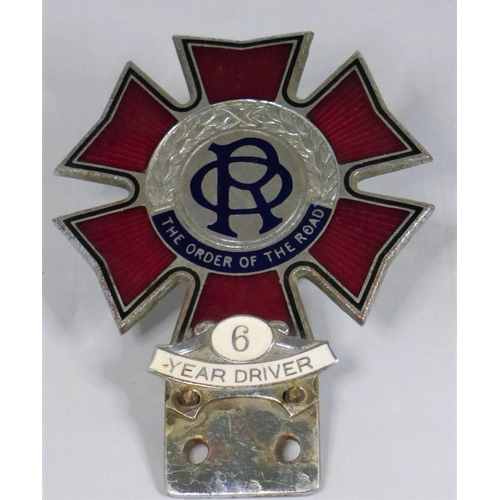 181 - The Order of the Road. A red enamel badge promoting courtesy on the road, founded in 1928, this badg... 