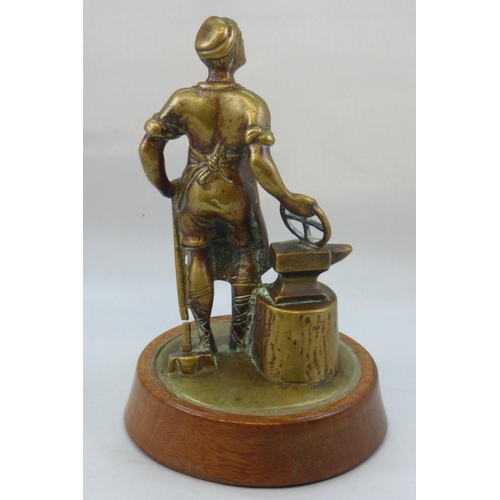 185 - A Vulcan 'Blacksmith' Mascot. An early example, mounted on a display base, good detail and patina. 1... 