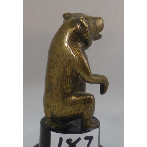 187 - A Squatting Bear Mascot. Of the type offered by Brown Brothers. Good detail and fur featured. 10 cms... 