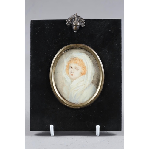 249 - After Romney: a watercolour portrait miniature of Emma Lady Hamilton, 2 3/4