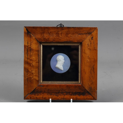 251 - A 19th century bisque porcelain cameo portrait of Napoleon, 2 1/8