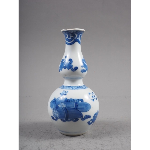 102 - A Chinese blue and white double gourd vase with precious object decoration 5