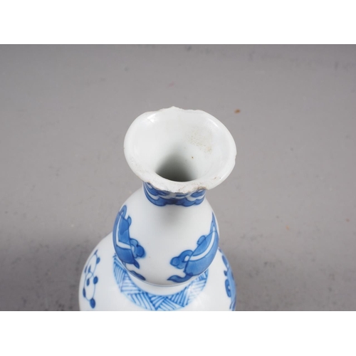 102 - A Chinese blue and white double gourd vase with precious object decoration 5