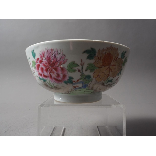 107 - A 19th century Chinese famille rose bowl with floral decoration, 7