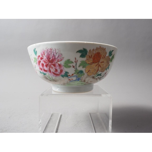 107 - A 19th century Chinese famille rose bowl with floral decoration, 7