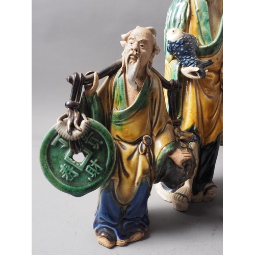 112 - Three Chinese pottery figures, various, tallest 10 1/2