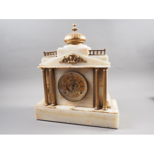 170 - A slate mantle clock of architectural form, a similar onyx mantel clock and a gilt cased mantle cloc... 