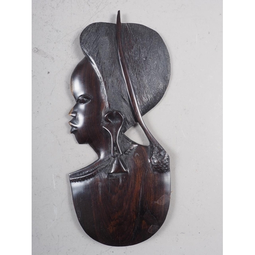 218 - A carved ebony head of a man, 9