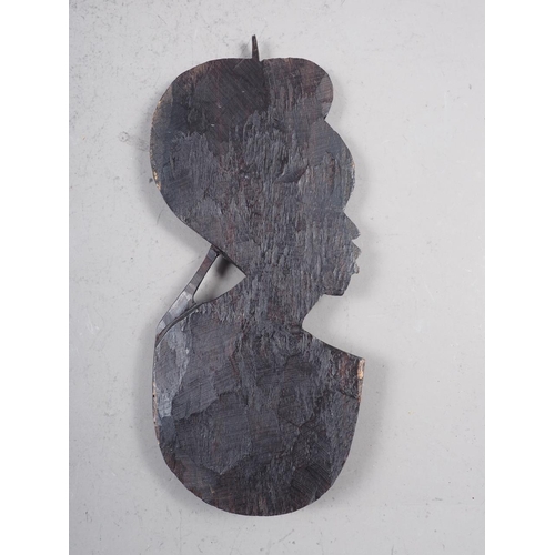 218 - A carved ebony head of a man, 9