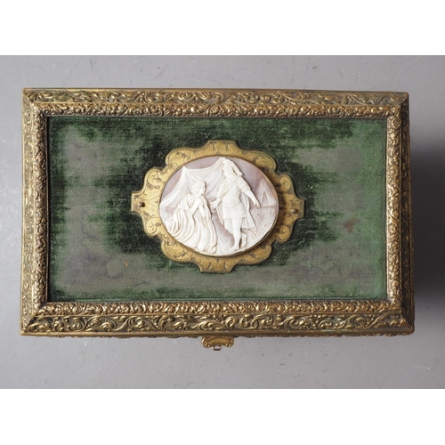 223 - A green velvet and brass casket, lid mounted with carved shell cameo, 7