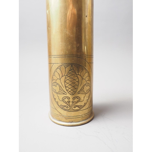 236 - A brass trench art shell case with engraved decoration, 9 1/4