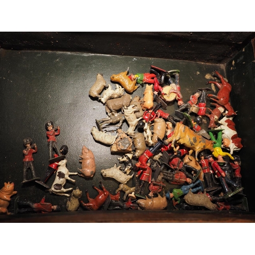 244 - A quantity of mostly lead painted toy figures and animals, including farming figures and animals, co... 