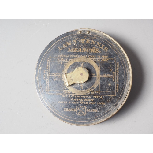 251 - A brass cased Lawn Tennis Measure, 4