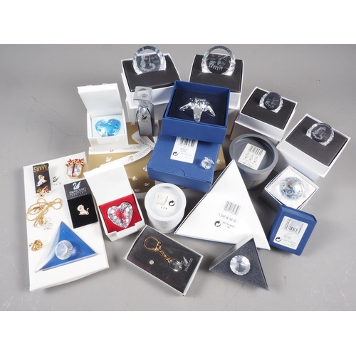 30 - A collection of Swarovski Collectors Club issue, plaques, key fobs, Christmas decorations, etc, most... 