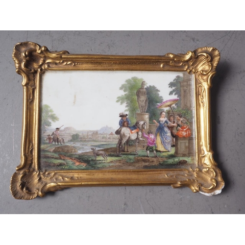 4 - A Continental porcelain plaque, formed as a painting with figures in a landscape decoration, in gilt... 