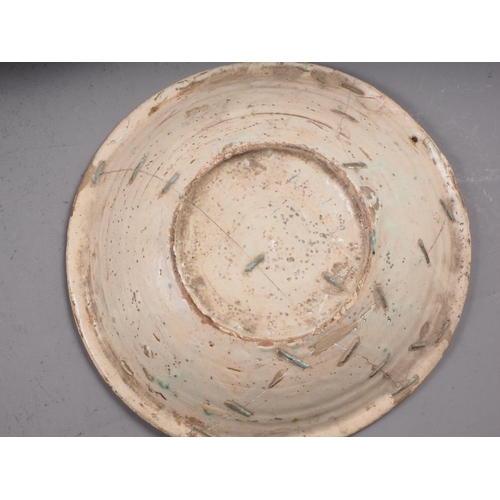 56 - A tin-glazed bowl with fish decoration, 12