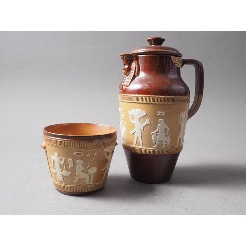 61 - A Royal Doulton stoneware jug with relief Egyptian decoration, 9