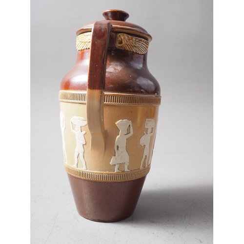 61 - A Royal Doulton stoneware jug with relief Egyptian decoration, 9