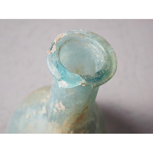 73 - A Roman glass bottle vase, 5