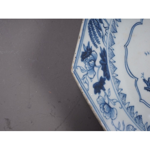 92 - A Chinese blue and white octagonal plate with bird, tree and flower decoration, 8 1/4