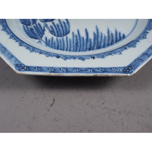 94 - A Chinese blue and white octagonal plate with central landscape decoration and acanthus leaf and flo... 