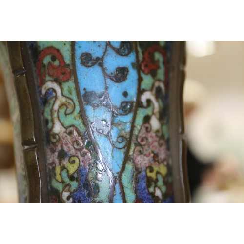 136 - An antique Chinese cloisonne gu vase with all-over scroll and mask design, 14