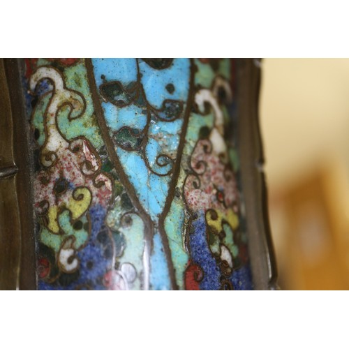 136 - An antique Chinese cloisonne gu vase with all-over scroll and mask design, 14