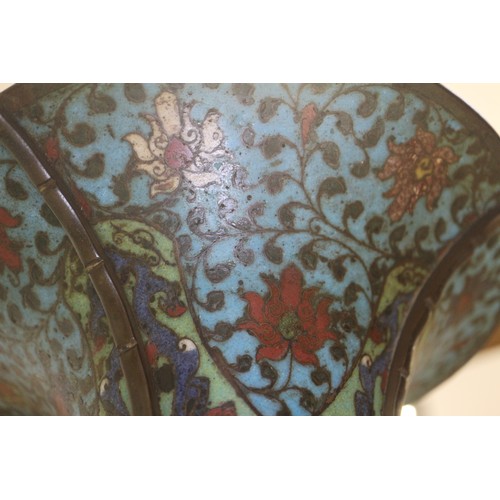 136 - An antique Chinese cloisonne gu vase with all-over scroll and mask design, 14