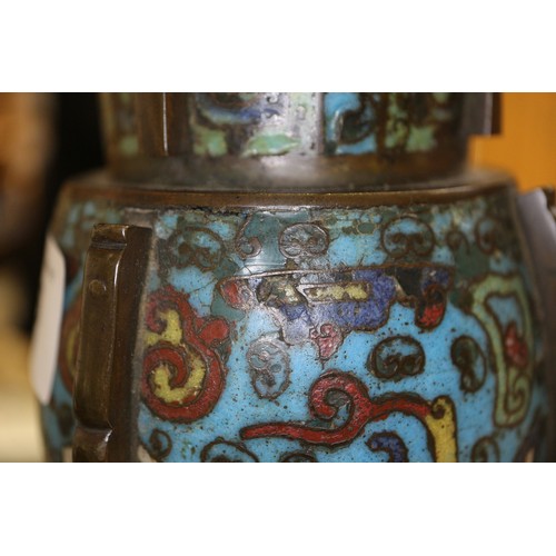 136 - An antique Chinese cloisonne gu vase with all-over scroll and mask design, 14