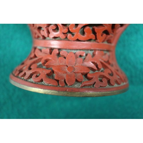 135 - A Chinese cinnabar lacquered wall pocket, formed as a vase with dragon and flower decoration, 9