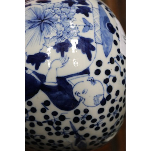 91 - A Chinese blue and white bulbous vase with figures carrying a vase, bird and insect decoration, seal... 