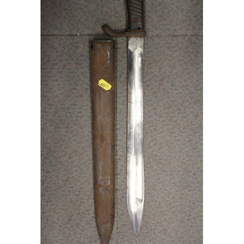 242 - An early 20th century sword bayonet, 27