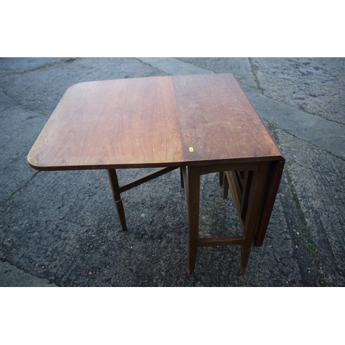 523 - A walnut deep drop leaf dining table, 30