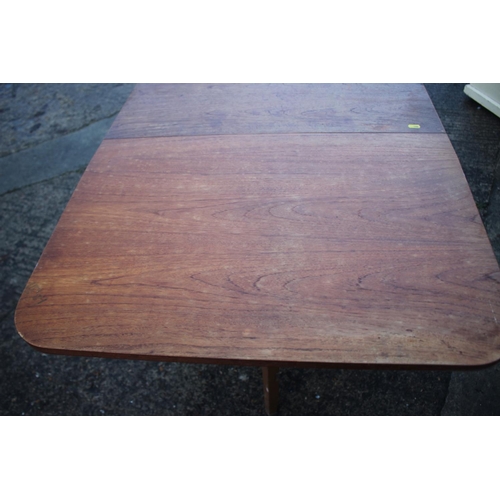 523 - A walnut deep drop leaf dining table, 30