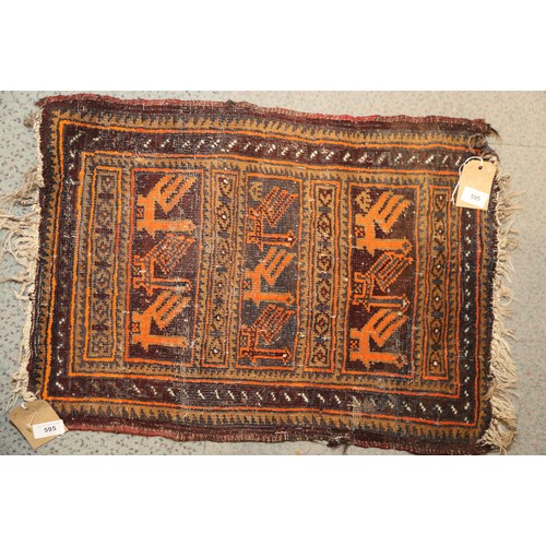 574 - A tribal woven mat with bird design, in shades of natural and orange on a brown ground, 25 1/2