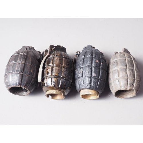 179 - An inert Mills No 5 MK I grenade by WW&S Ltd 9/16, another No 5 MK I, by WB 1916, and two simila... 