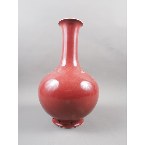 117 - A Chinese sang de boeuf baluster vase with seal mark to base, 14 1/2