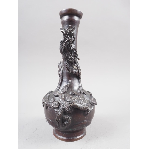 119 - A Japanese patinated vase with relief dragon and tree decoration, 7 1/4