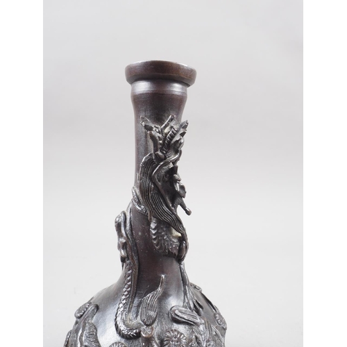 119 - A Japanese patinated vase with relief dragon and tree decoration, 7 1/4